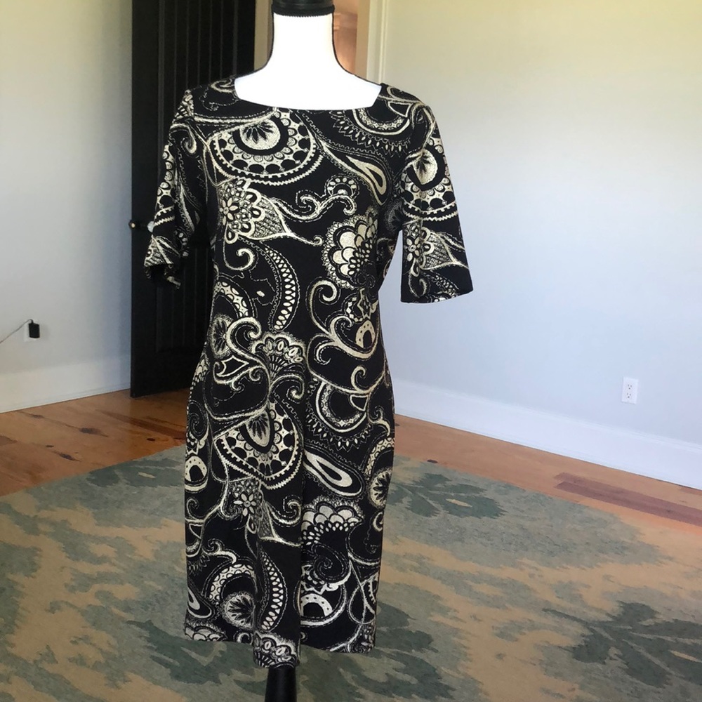 Black and gold shift dress.